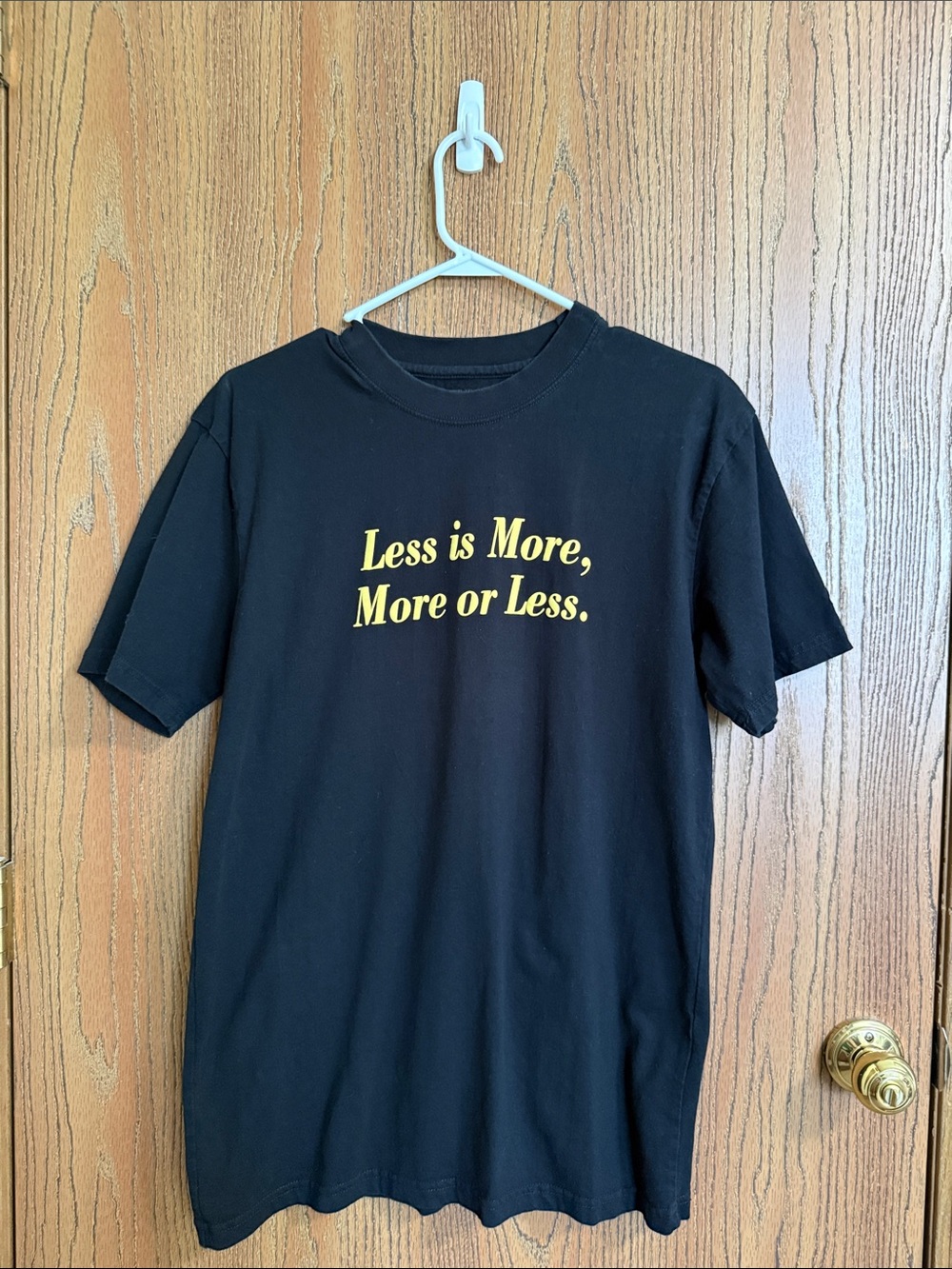 Men's Black Short Sleeve Graphic Tee with Yellow Text